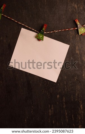 Christmas decoration with black wooden board. Santa, Christmas tree, car with gift box.