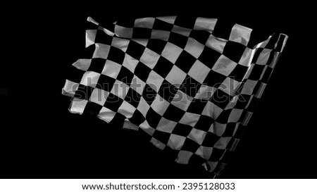 Checkered Race Flag. Freeze Motion Wavy closeup fabric fluttering Racing Flags background. Formula One flag car motor sport. Royalty-Free Stock Photo #2395128033