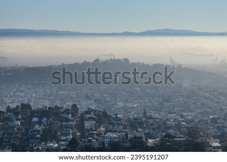 Beautiful view of San Francisco on a foggy and cloudy morning, as seen from, the Two Peaks