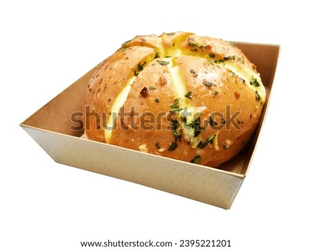 Korean cream cheese garlic bread in Kraft box food isolated with clipping path, no shadow in white background, bakery pastry bread Royalty-Free Stock Photo #2395221201