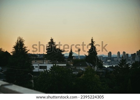 Space Needle and Seattle skyline from rooftop in West Seattle