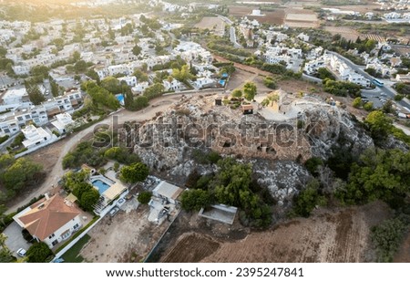 Drone aerial top view of holiday resort town. Protaras city at sunset. Summer vacation place. Cyprus Europe