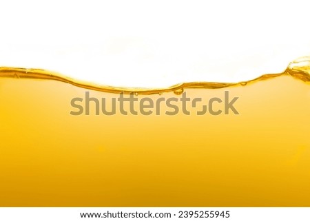 Appearance surface poured brownish yellow lubricant liquid for bubbles background can use cooking oil.	 Royalty-Free Stock Photo #2395255945