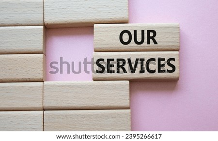 Our services symbol. Concept words Our services on wooden blocks. Beautiful pink background. Business and Our services concept. Copy space.