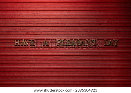 Golden letters on a red board