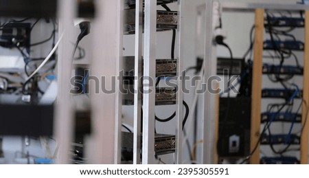 Server farm in indoor data center. Mining on hard drive concept