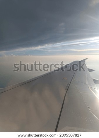 Airfoil, During the plane flight  Royalty-Free Stock Photo #2395307827