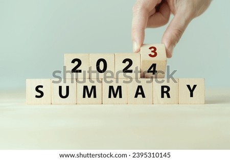 2023 year summary text on wooden cube blocks on smart grey background. Past performance analysis for learning and  improvement. Preparation for annual plan in 2024. End of year concept. Royalty-Free Stock Photo #2395310145