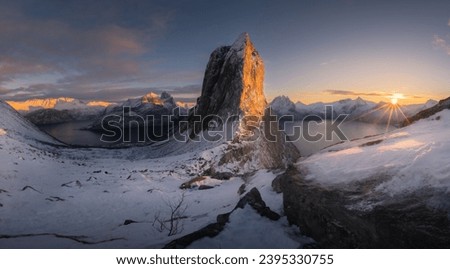 Winter hike to the Segla mountain in Senja, Norway, amazing sunset Royalty-Free Stock Photo #2395330755