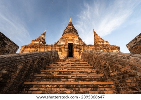 Wat Yai Chai Mongkhon in sunrise Royalty-Free Stock Photo #2395368647