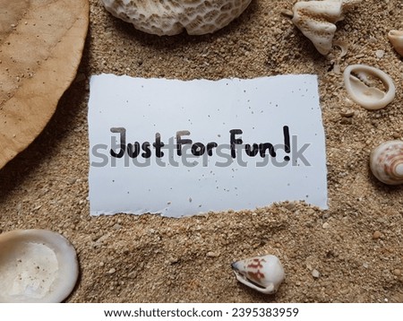 The writing just for fun on the beach sand background.