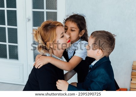 Kids boy and girl congratulating on teacher's holiday