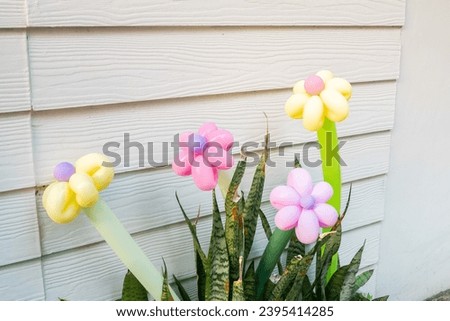 Balloons twisted into a blossoming flower bouquet in garden,Flowers Balloon to decorate the place,bouquet with colorful balloon flowers.