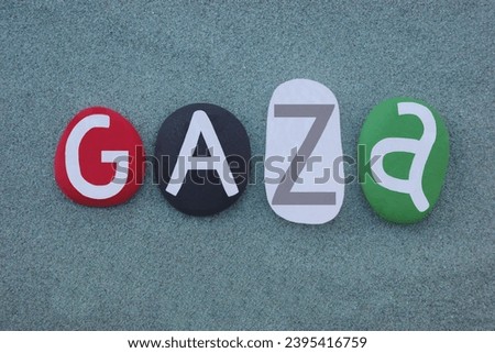 Gaza or Gaza City, Palestinian city in the Gaza Strip and the largest city in the State of Palestine, creative text composed with national flag colors over four stones with green sand background