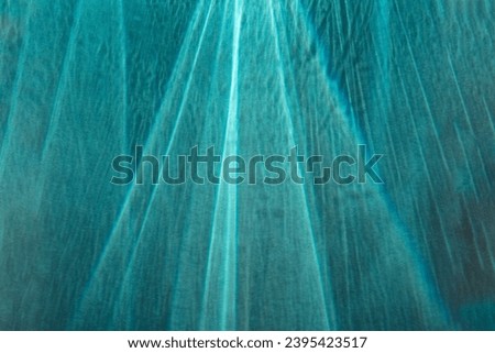 Abstract blue caustic strobe prism texture overlay. Summer copy paste background