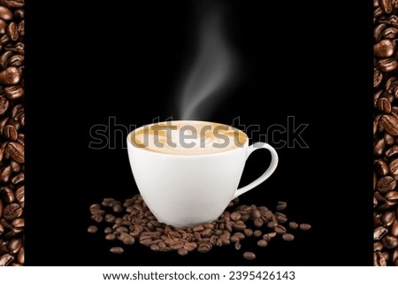 Image of hot coffee with hot steam rising up from the cup. on a black background There are rows of coffee beans along the edge of the picture. Suitable for use in food and beverage media.