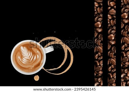 Image of hot coffee with hot steam rising up from the cup. on a black background There are rows of coffee beans along the edge of the picture. Suitable for use in food and beverage media.
