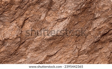 Brown cliff rock formations Textures and patterns backgrounds  Royalty-Free Stock Photo #2395442365