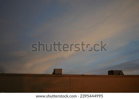 Gorgeous sunset and building background with high quality outdoors photography. Perfect for hd wallpaper, beautiful relaxing aesthetic.