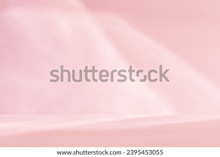Empty pink colour room studio with sunlight effect shadow on the floor and wall for product presentation. Minimal backdrop design. Cosmetic, beauty and fashion showroom. Summer background mock up.