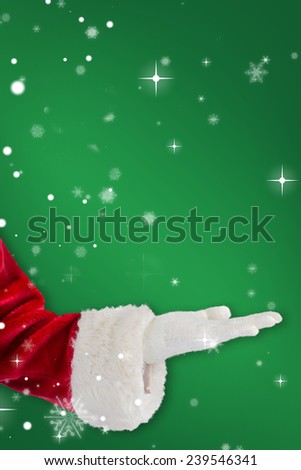 Santa claus presenting with hand against green