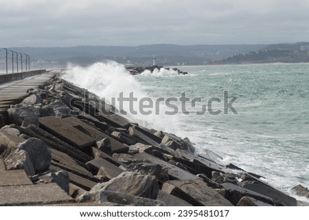 sea waves beat the rocks, the waves swelled Royalty-Free Stock Photo #2395481017