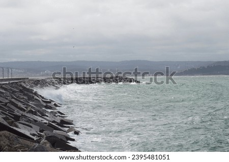 sea waves beat the rocks, the waves swelled