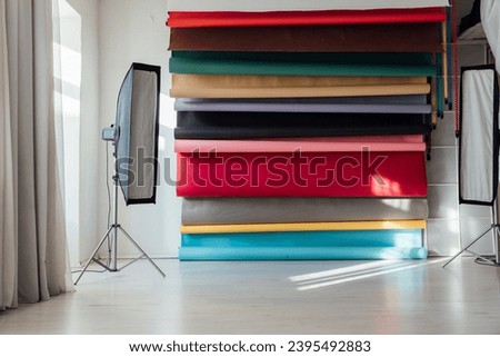 backgrounds of different colors flash in the photo studio