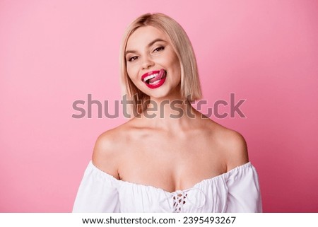 Photo of positive seductive lady wear off shoulders dress licking lips isolated pink color background