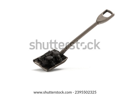 Shovel with coal, clipping path included
