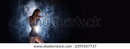 Banner. Flyer. Focused and powerful, female sportsman gearing up for battle, against black studio background in stage smoke. Negative space for text. Concept of sport, active lifestyle, competition.