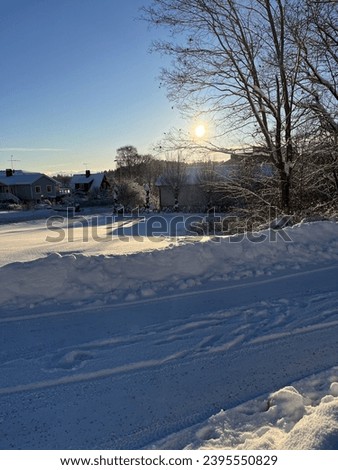 A sunny winter morning in the outskirts of a small town.
