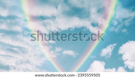 Two rainbows in the tropical blue sky. Bright sky background image.
