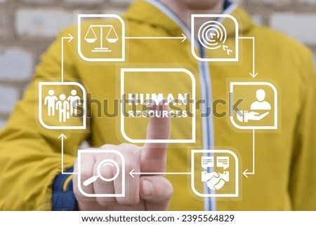 Recruiter using virtual touch screen presses inscription: HUMAN RESOURCES. Human resources (HR) and management (HRM) concept. Recruitment, searching candidate.