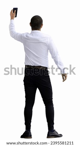 man isolated on a white background in business clothes with a loudspeaker in his hand