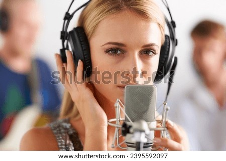 Music, portrait and woman with microphone, headphones and band performance with talent. Recording studio, art and girl musician live streaming, singing for record label with sound and audio singer.