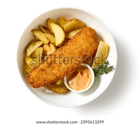 bowl of breaded fish fillet and fried potato wedges isolated on white background, top view