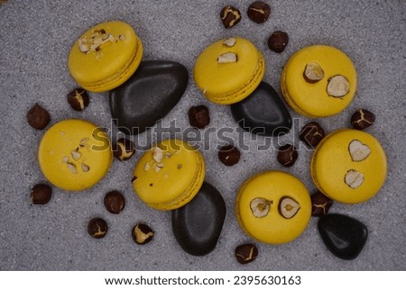 yellow macarons on grey backround