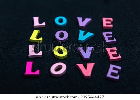 Colorful love inscription made of wooden blocks