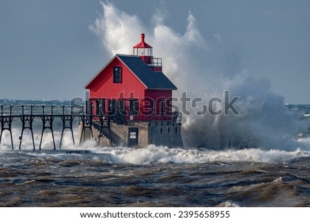 Grand Haven Pier and high seas Royalty-Free Stock Photo #2395658955