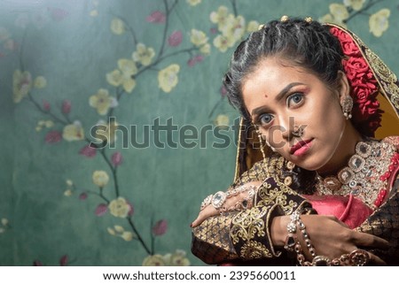 Portrait of a young beautiful woman with posing in front of a printed background,model photo shoot concept.