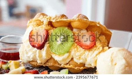 Bread stuffed with sweet ice cream Contains citrus fruits as additional ingredients. Dessert menu, close-up focus, clearly see the layers of desserts Suitable for use as a background image or for crea