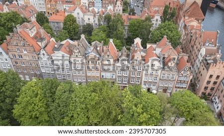 Gdansk, Poland,Europe. Beautiful panoramic aerial photo from drone to old city Gdansk, Motlawa river and Gothic St Mary church, city hall tower, the oldest medieval port crane (Zuraw) and old houses
