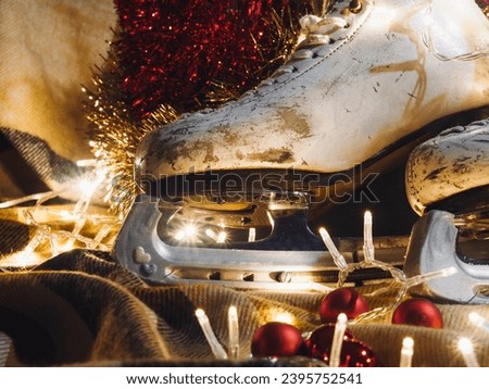 Christmas decor with skates. Old skates with garlands