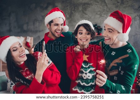 Photo of funky cheerful fellows smart phone make picture hand hold bengal dire enjoy magic christmas time house indoors