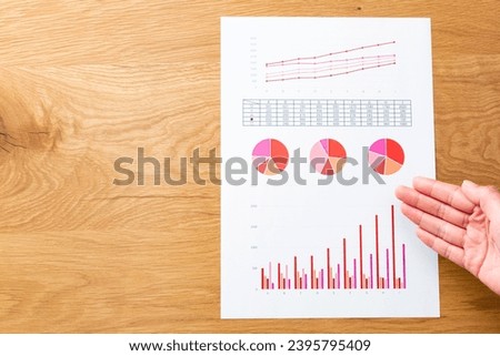 Paper graph on the desk.