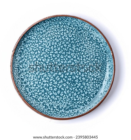 Empty trendy handmade ceramic dish tablewares Round empty plate Pastel blue turquoise aqua texture vintage classic pattern isolate on white background, top view, cut out Royalty-Free Stock Photo #2395803445