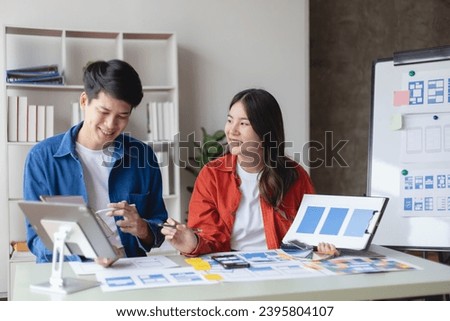 Business teamwork and working with UX developer and UI designer at table in modern office. Creative and development agency concept.