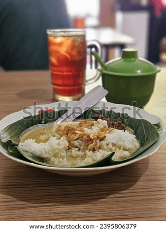 Picture of traditional dish from middle java, it contain meat, coconut milk spices and fried onion