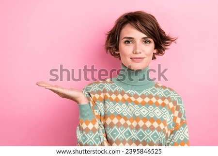 Photo of gorgeous girl hand palm hold demonstrate empty space proposition ad isolated on pink color background
